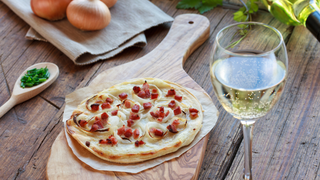 Flammkuchen and wine served at a Besenwirtschaft in Germany